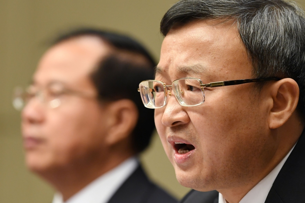 China's Vice Minister of Commerce Wang Shouwen speaks at a press conference in Beijing on September 25, 2018. AFP / Greg Baker