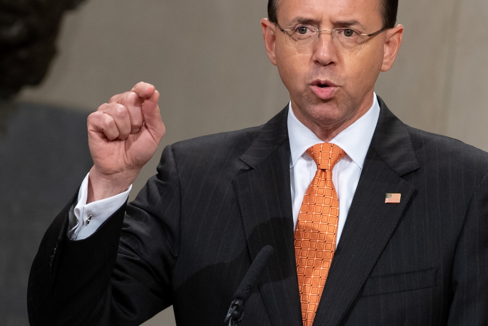 (FILES) In this file photo taken on September 18, 2018 US Deputy Attorney General Rod Rosenstein speaks during the Second Annual Attorney General's Award for Distinguished Service in Policing at the Department of Justice in Washington, DC. AFP / SAUL LOEB