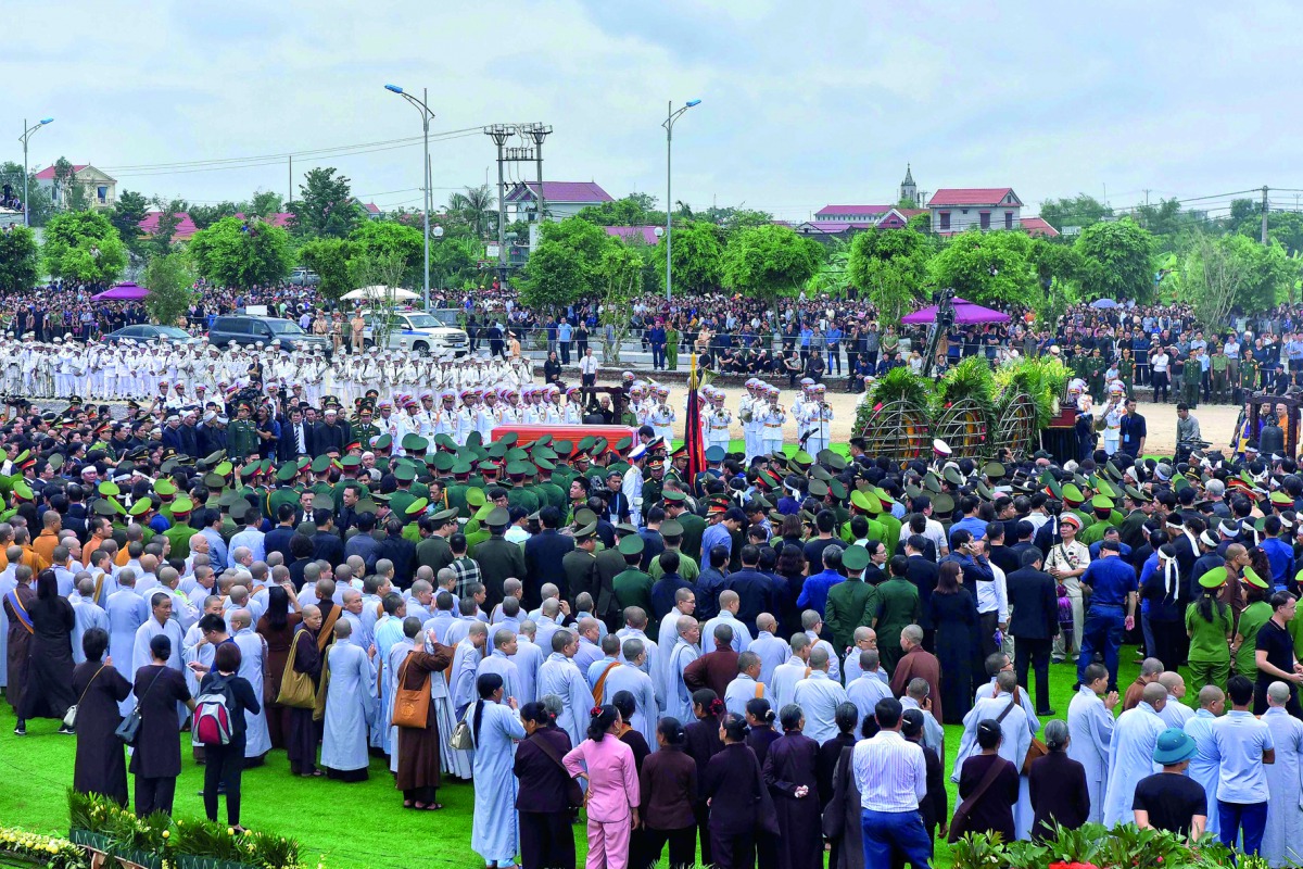 People attend the funeral service of Vietnam's president Tran Dai Quang in his hometown Ninh Binh province on September 27, 2018. Quang died on September 21 at age 61 after a prolonged illness that officials described only as a 