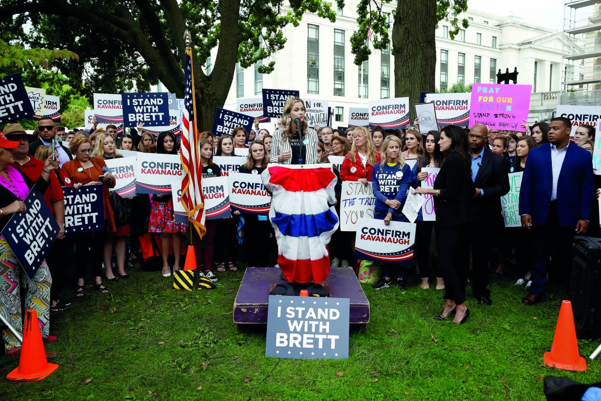 Supporters of US Supreme Court nominee Brett Kavanaugh rally before a hearing where Christine Blasey Ford will testify about an accusation that Kavanaugh had sexually assaulted her in 1982 on Capitol Hill in Washington, September 27, 2018. Reuters/Joshua 