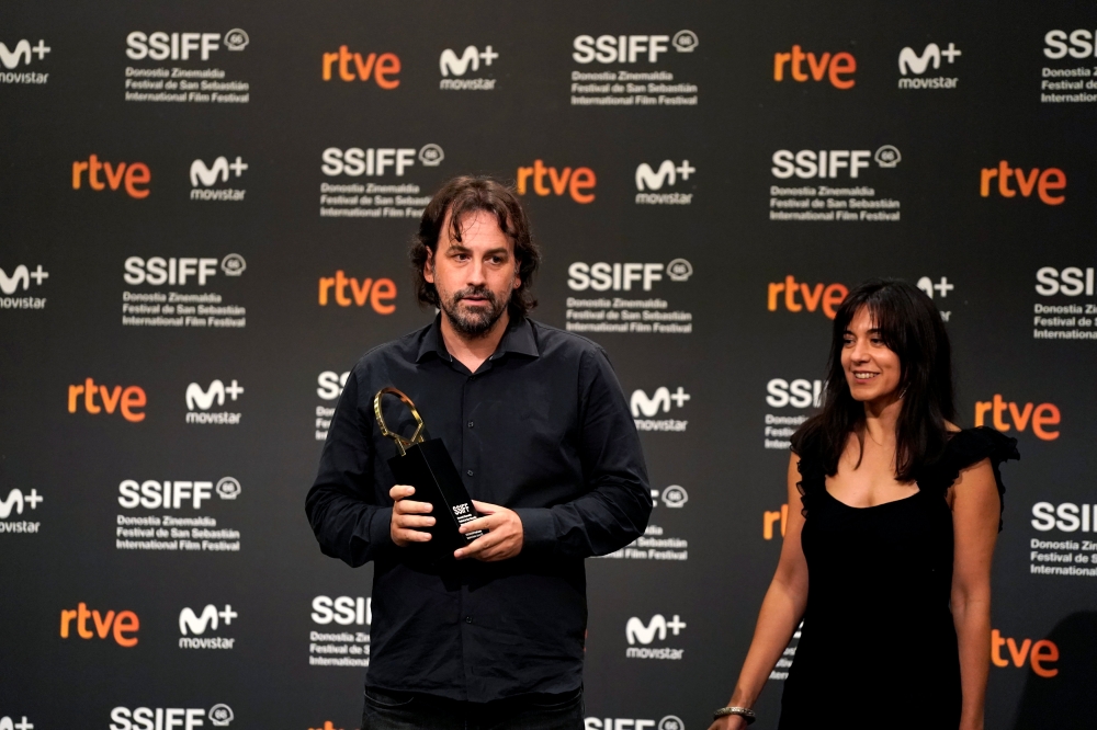 Director Isaki Lacuesta speaks after receiving the Concha de Oro (Golden Shell) for Best Film, for the film Entre Dos Aguas (Between Two Waters) at the San Sebastian Film Festival, Spain, September 29, 2018. REUTERS/Vincent West