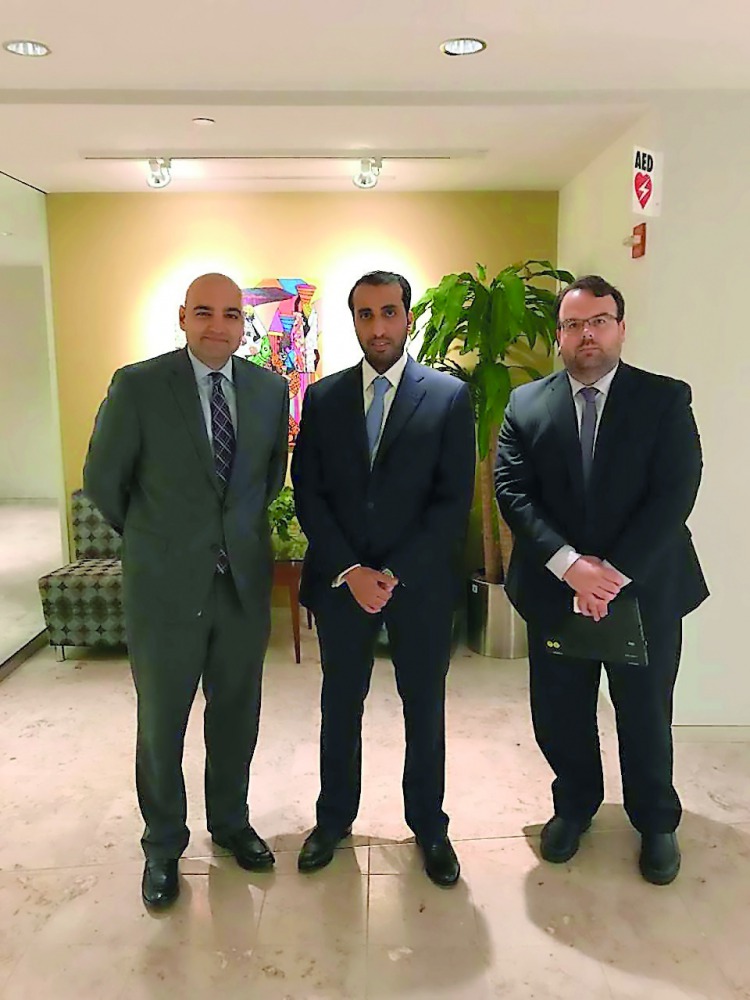 Faisal bin Rashid Al Sahouti (centre) with other officials during the visit to ICSID.