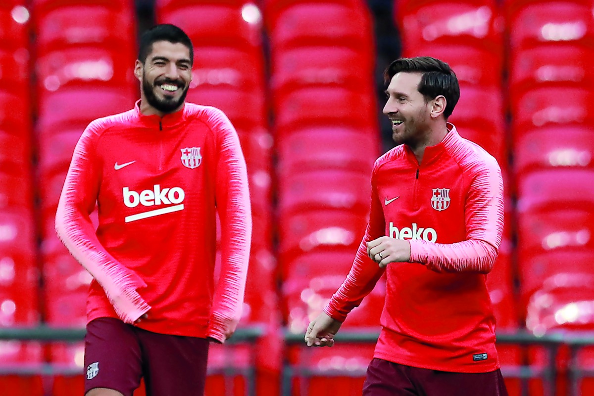 Barcelona's Lionel Messi and Luis Suarez during training. Action Images via Reuters/Andrew Couldridge