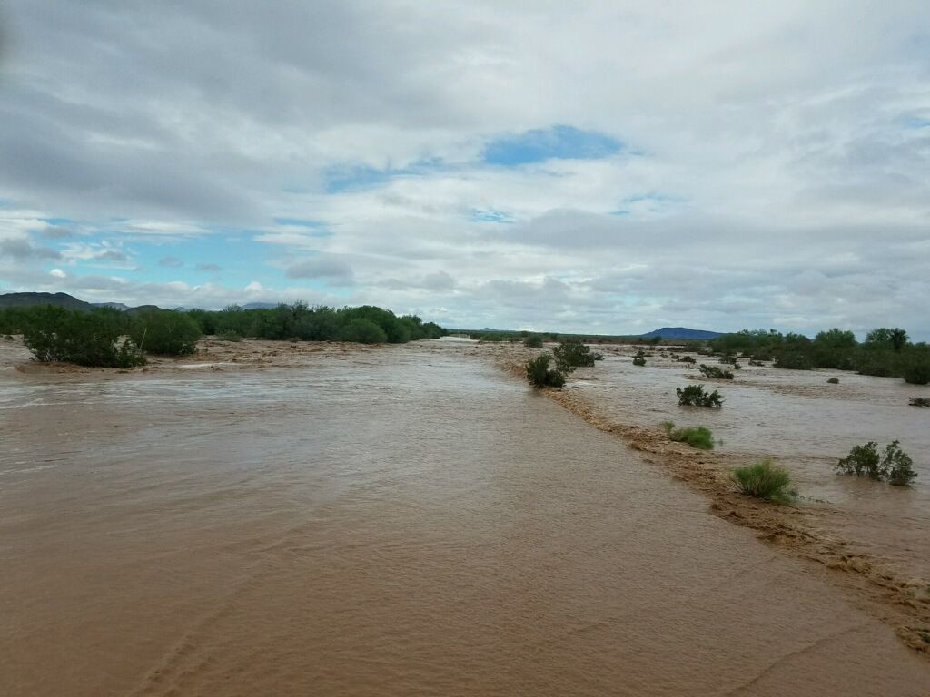 Water levels were within a foot (0.3 meters) of topping Menagers Dam, which could give way and flood Ali Chuk, the National Weather Service said. (Photo courtesy: tucson.com)