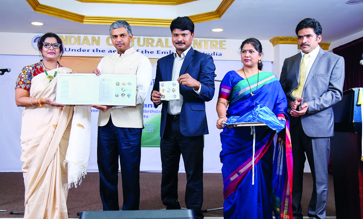 Indian Ambassador P Kumaran (second left) releasing the stamps commemorating the 150th birthday of Mahatma Gandhi.