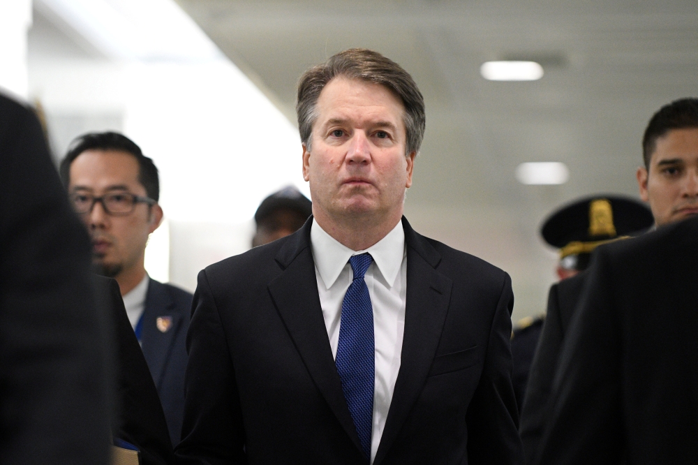 FILE PHOTO: US Supreme Court nominee Brett Kavanaugh arrives for his Senate Judiciary Committee confirmation hearing in Washington, U.S., September 27, 2018. REUTERS/Mary F. Calvert/File Photo
 