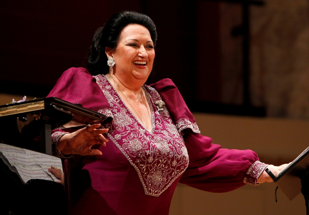 FILE PHOTO: Spanish opera singer Montserrat Caballe laughs during a concert at Konzerthaus in Vienna, Austria June 22, 2011. REUTERS/Lisi Niesner/File Photo