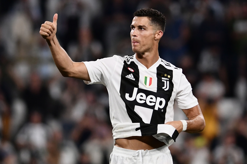 FILE PHOTO: Cristiano Ronaldo. AFP / Marco BERTORELLO

