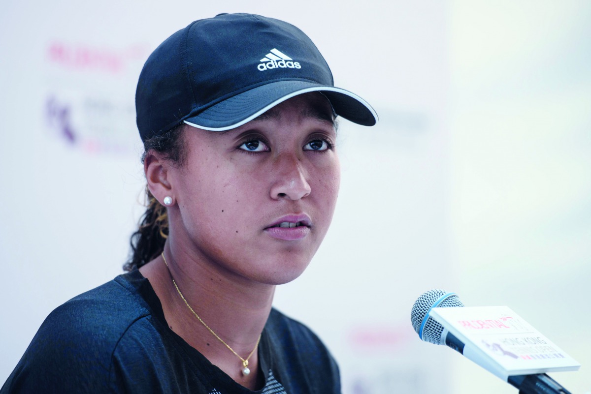 Naomi Osaka of Japan speaks during a press conference at the Hong Kong Open tennis tournament on October 8, 2018. AFP / Anthony Wallace
