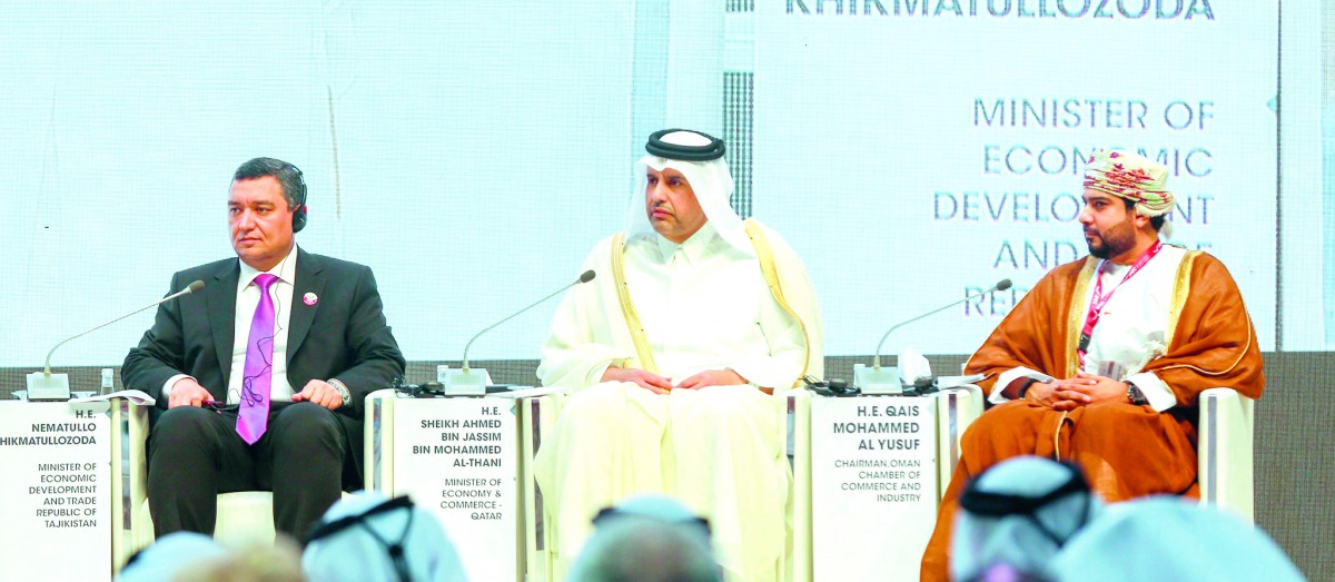 H E Sheikh Ahmed bin Jassim bin Mohammed Al Thani (centre), Minister of Economy and Commerce; Qais Mohammed Al Yusuf (right), Chairman, Oman Chamber of Commerce and Industry; and Nematullo Hikmatullozoda, Minister of Economic Development and Trade, Republ