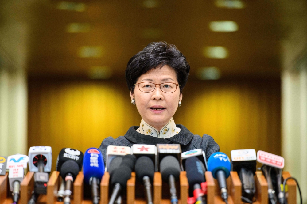 Hong Kong Chief Executive Carrie Lam speaks during her weekly address at the government headquarters in Hong Kong on October 9, 2018. / AFP / Anthony WALLACE