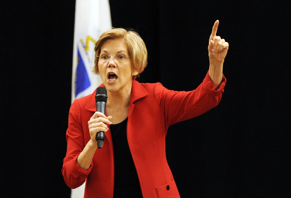 US Senator Elizabeth Warren (D-MA) addresses a town hall meeting in Roxbury, Massachusetts, October 13, 2018. / AFP / Joseph PREZIOSO