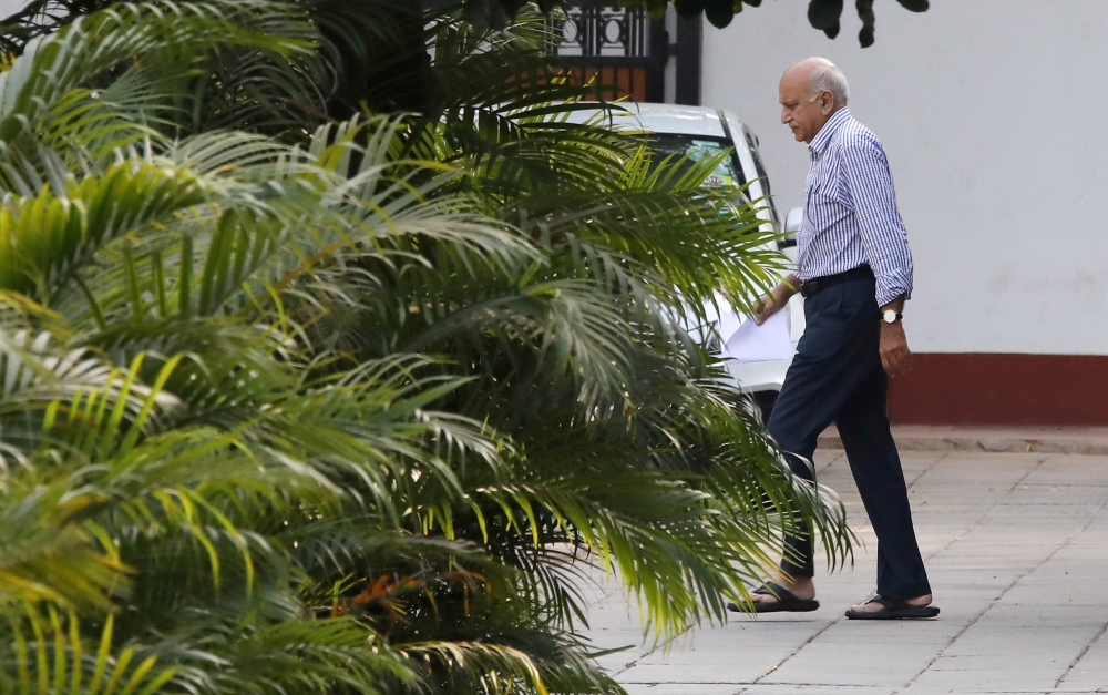 FILE PHOTO: India's Minister of State for External Affairs Mobashar Jawed Akbar walks inside his residence in New Delhi, India, October 14, 2018. Reuters/Anushree Fadnavis/File Photo