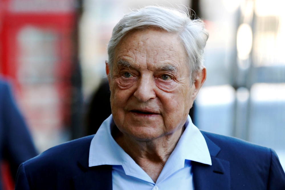 File photo of business magnate George Soros arrives to speak at the Open Russia Club in London, Britain June 20, 2016. REUTERS/Luke MacGregor/File Photo