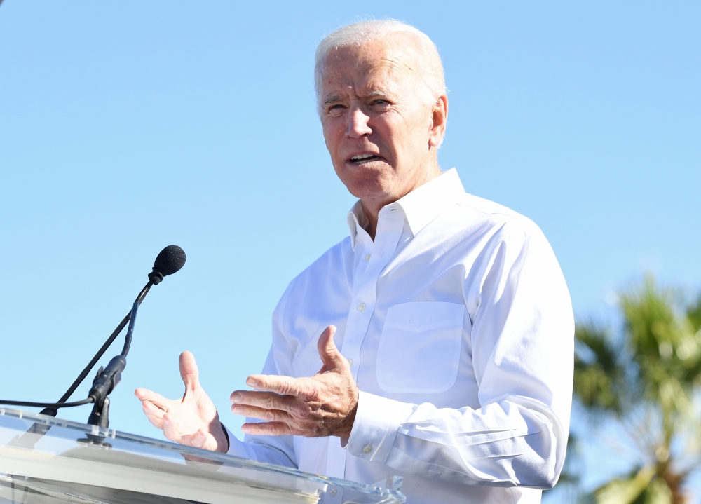 FILE PHOTO: In this file photo taken on October 20, 2018, former US Vice President Joe Biden speaks during a rally at the Culinary Workers Union Hall Local 226 as he campaigns for Nevada Democratic candidates in Las Vegas, Nevada.   AFP / Ethan Miller
