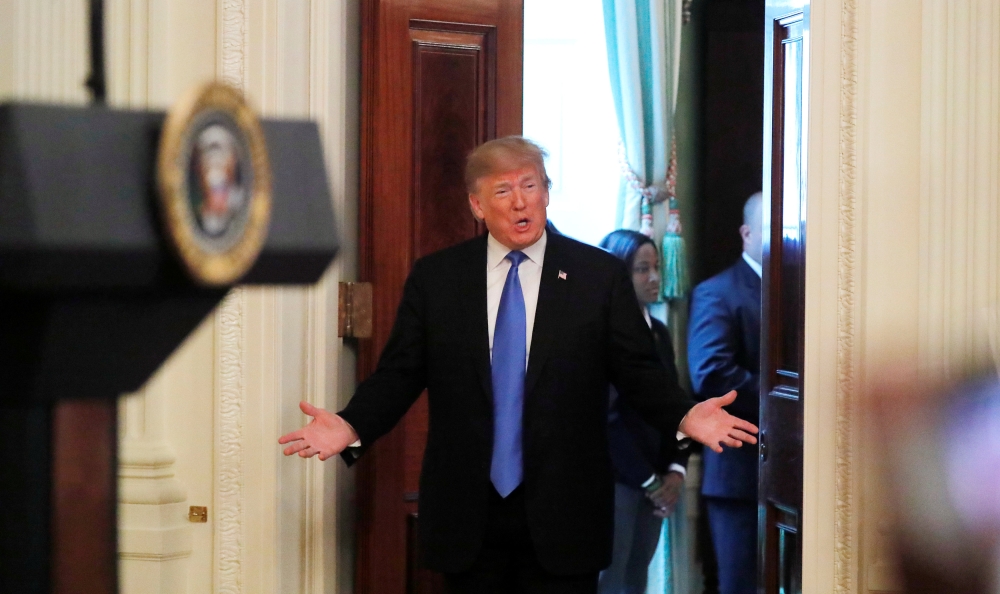 US President Donald Trump arrives to deliver remarks at the 