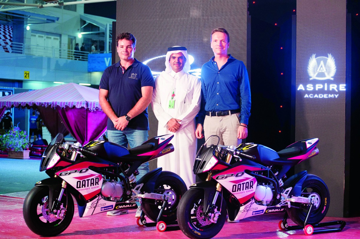 Khalid Al Remaihi (centre), Vice-President and General Manager of Losail Circuit Sports Club (LCSC), is seen along with Jose Luis Cardoso, a former MotoGP and WorldSBK rider, and Markus Egger, Director of Sport and Strategy, Aspire Academy, at Losail Inte