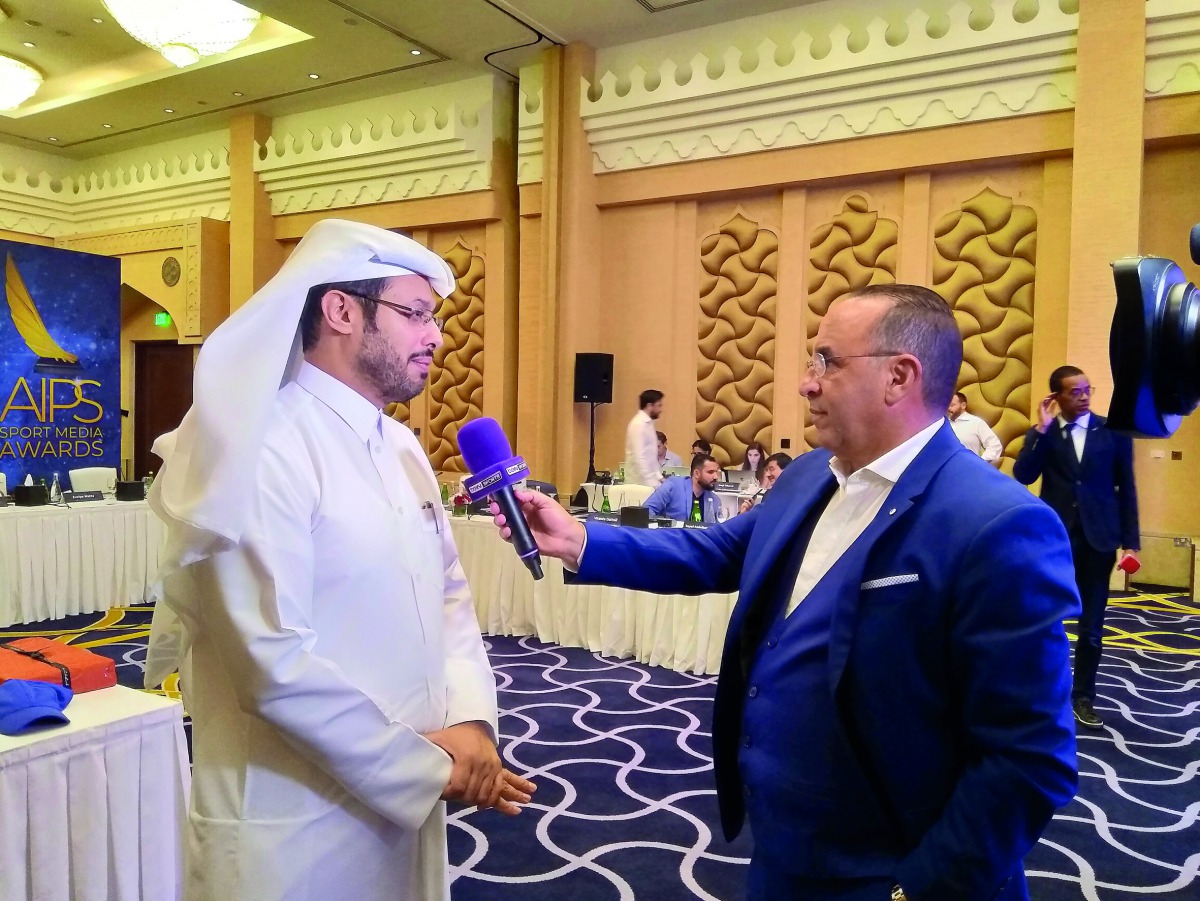 Qatar Sports Press Committee board member, Mubarak Al Boainin speaking to a journalist at the AIPS Executive Committee & Jury Meet, in Doha yesterday.