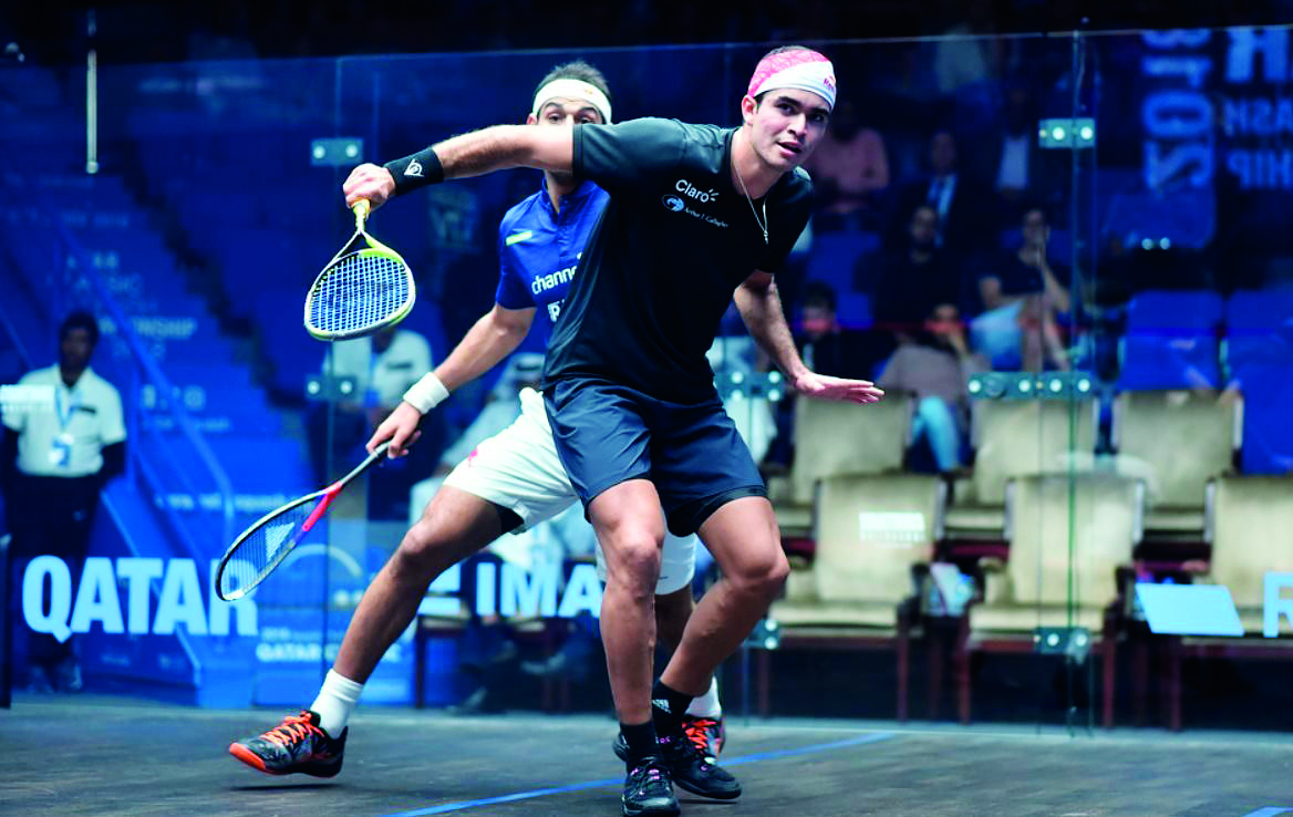 Diego Elias of Peru returns the ball to Mohamed Elshorbagy of Egypt during the quarter-final clash of the Qatar Classic 2018 at the Khalifa International Tennis and Squash Complex in Doha yesterday.