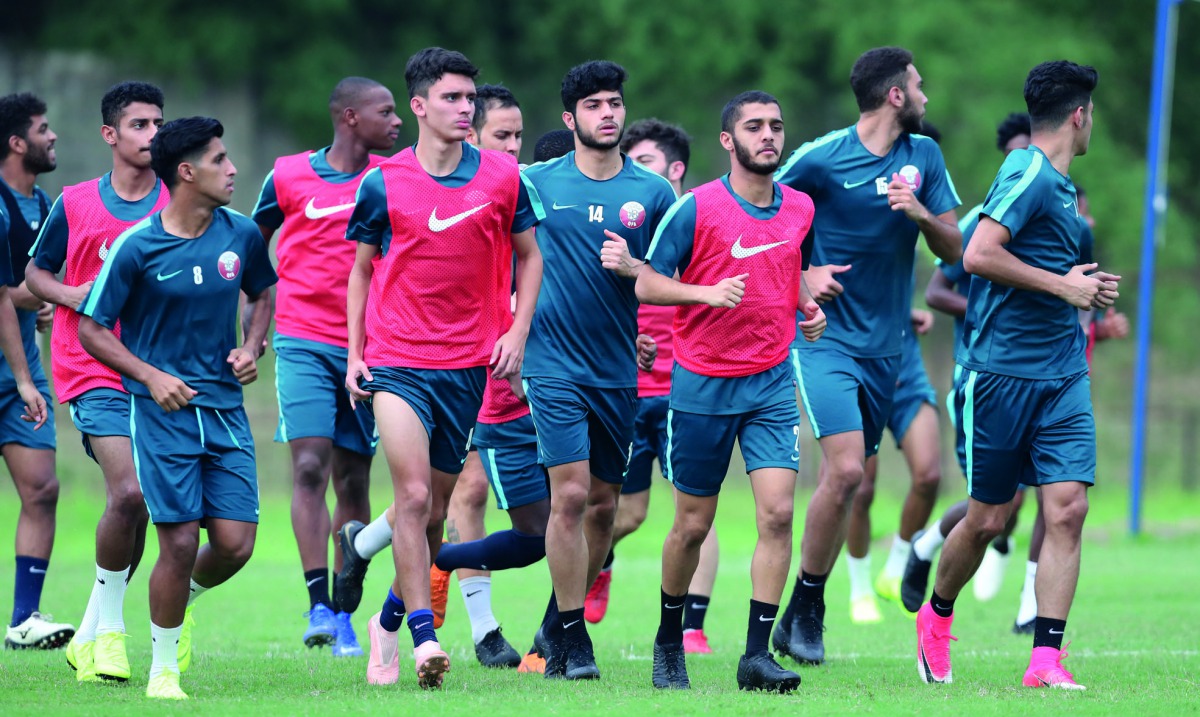 Qatari under-19 players in action during a practice session in Bogor, Indonesia yesterday, ahead of their AFC U-19 semi-final match against South Korea which will be played today.