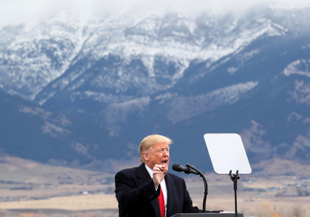 Donald Trump speaks during a campaign rally for Republican U.S. Senate candidate Matt Rosendale at the Bozeman Yellowstone International Airport in Belgrade, Montana, U.S., November 3, 2018. Reuters/Carlos Barria