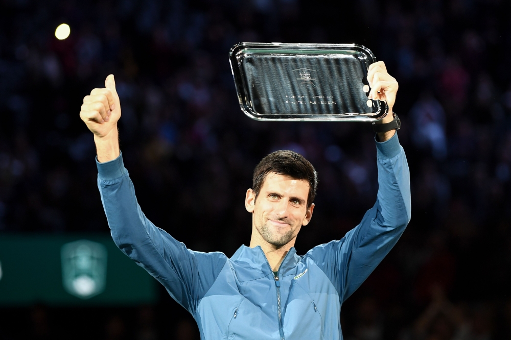  Second placed Serbia's Novak Djokovic poses with his trophy after the men's singles final tennis match against Russia's Karen Khachanov, on day seven of the ATP World Tour Masters 1000 - Rolex Paris Masters - indoor tennis tournament at The AccorHotels A