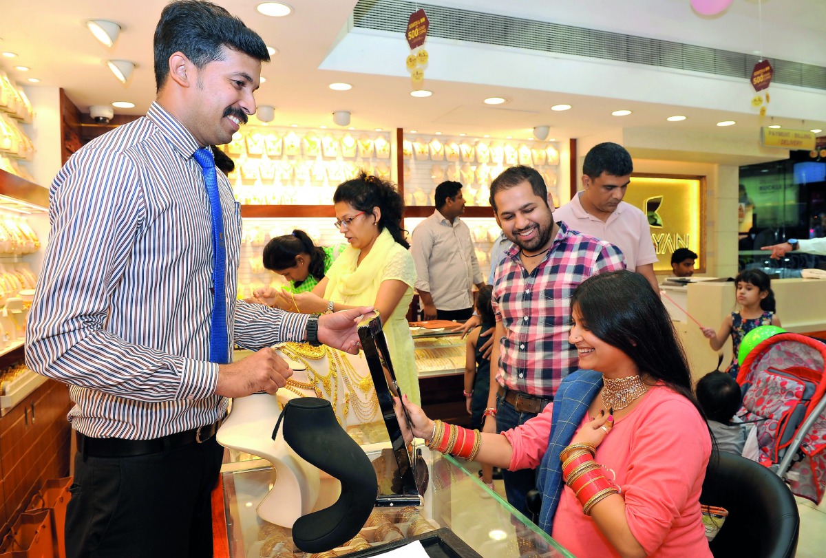 Salesmen pitching different jewellery designs to customers at Kalyan Jewellery. Pics: Salim Matramkot/The Peninsula