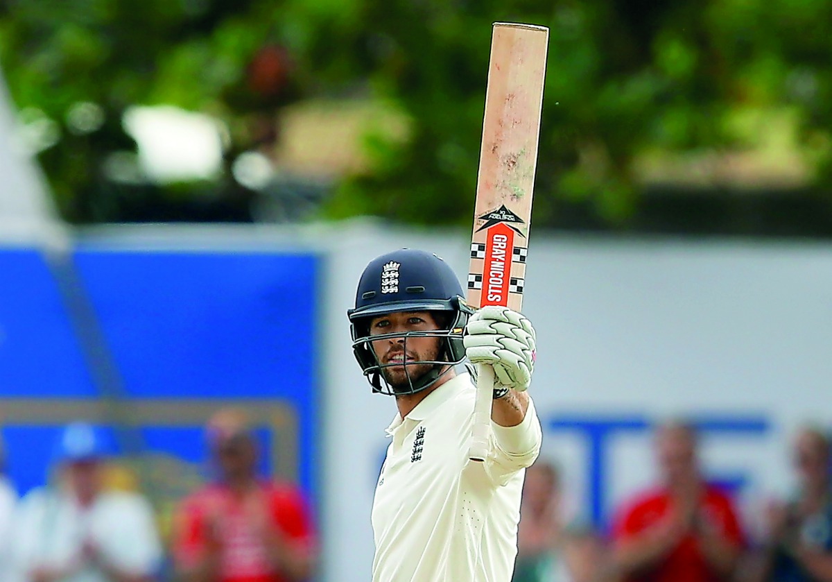 England's Ben Foakes celebrates his half century. Reuters/Dinuka Liyanawatte 
