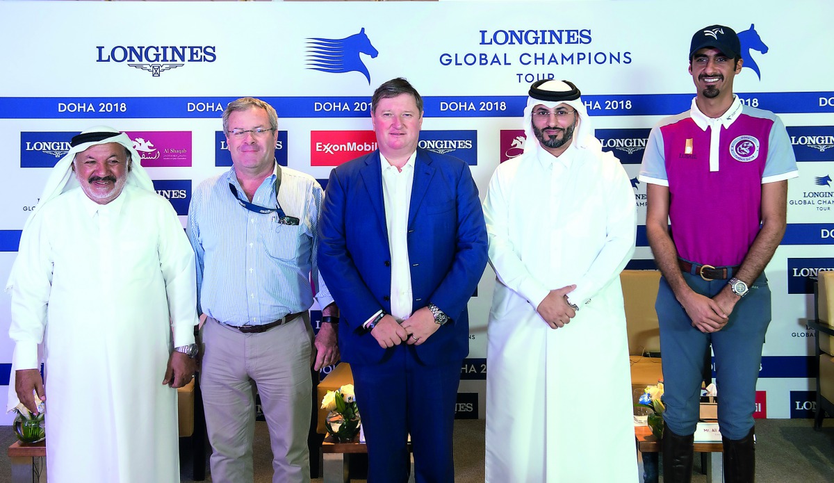Marco Danese, Longines Global Champions Tour (LGCT) Sports Director, Jan Tops, Founder and President of the LGCT, Ali Al Rumaihi, Event Director and Qatari rider Sheikh Ali bin Khalid Al Thani pose for a photograph during a press conference held in Doha, 