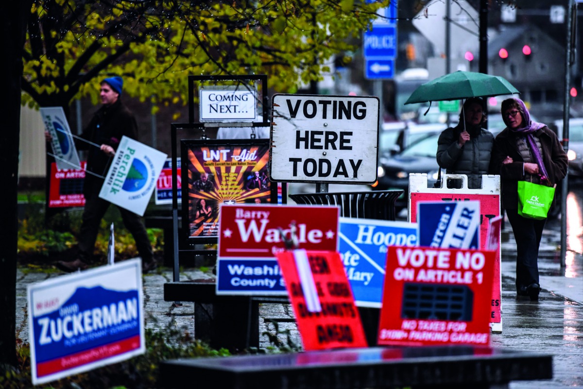 Campaign signs for various candidates outside the Montpelier Town Hall, in Montpelier, Vermont.