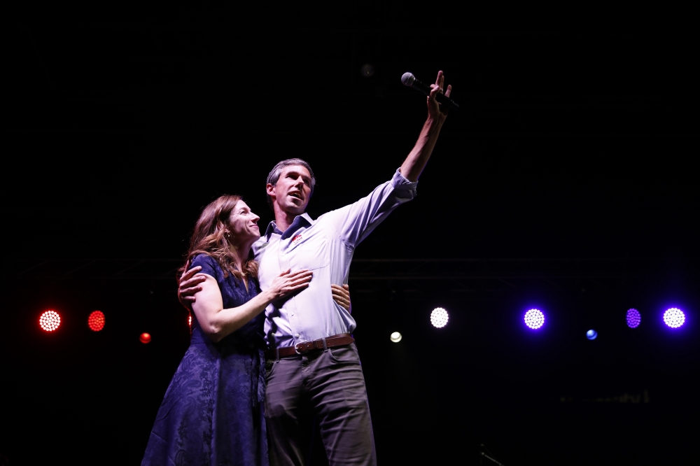 Democratic Texas U.S. Senate candidate Rep. Beto O'Rourke embraces his wife Amy as he concedes to Senator Ted Cruz at his midterm election night party in El Paso, Texas, U.S., November 6, 2018. REUTERS/Adria Malcolm