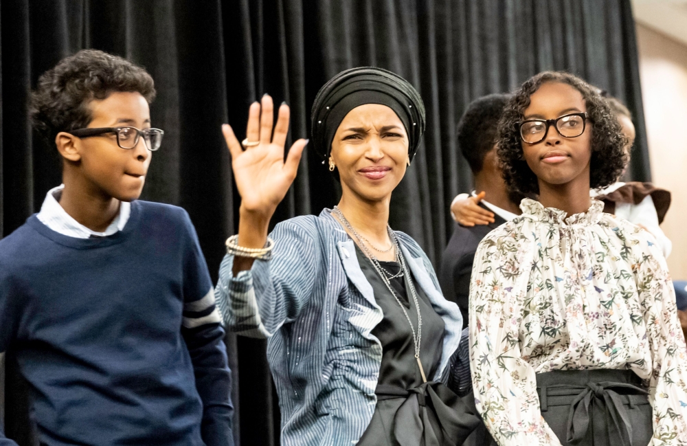 Ilhan Omar, newly elected to the US House of Representatives on the Democratic ticket, celebrates with her supporters after her Congressional 5th District primary victory in Minneapolis, Minnesota on November 6, 2018. AFP / Kerem Yucel 