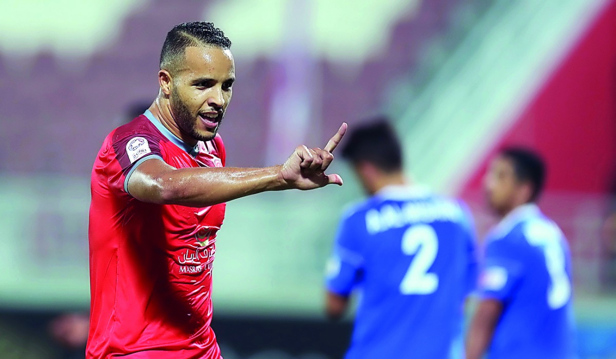 Al Duhail’s Yousef El Arabi celebrates after scoring a goal against  Al Shahania at Al Duhail Stadium yesterday. 
