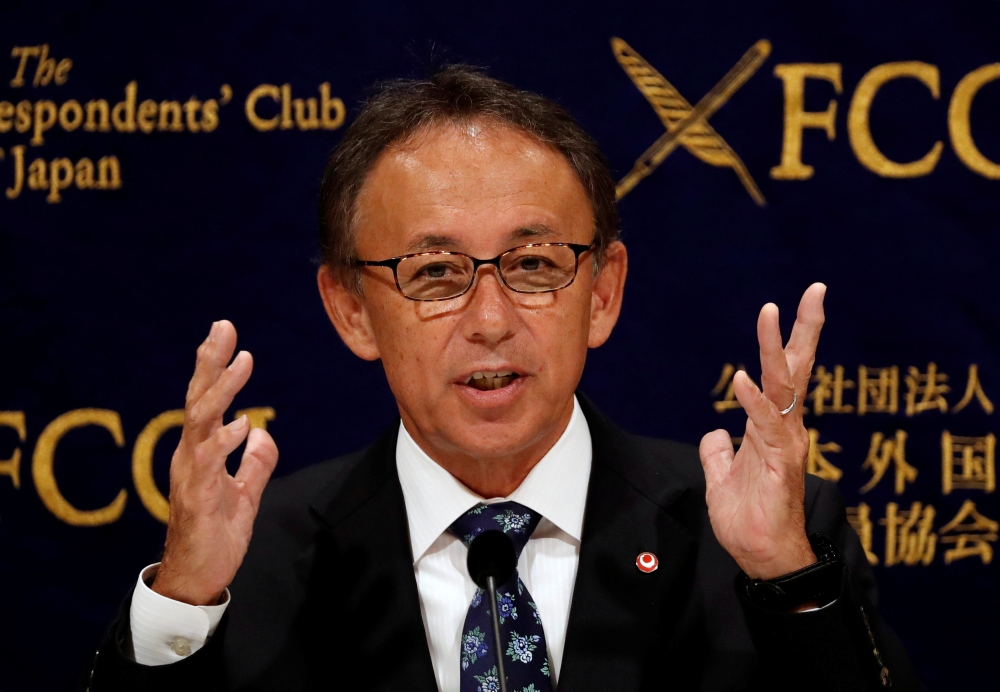 Okinawa Governor Denny Tamaki attends a news conference at at the Foreign Correspondents' Club of Japan in Tokyo, Japan November 9, 2018. REUTERS/Issei Kato
