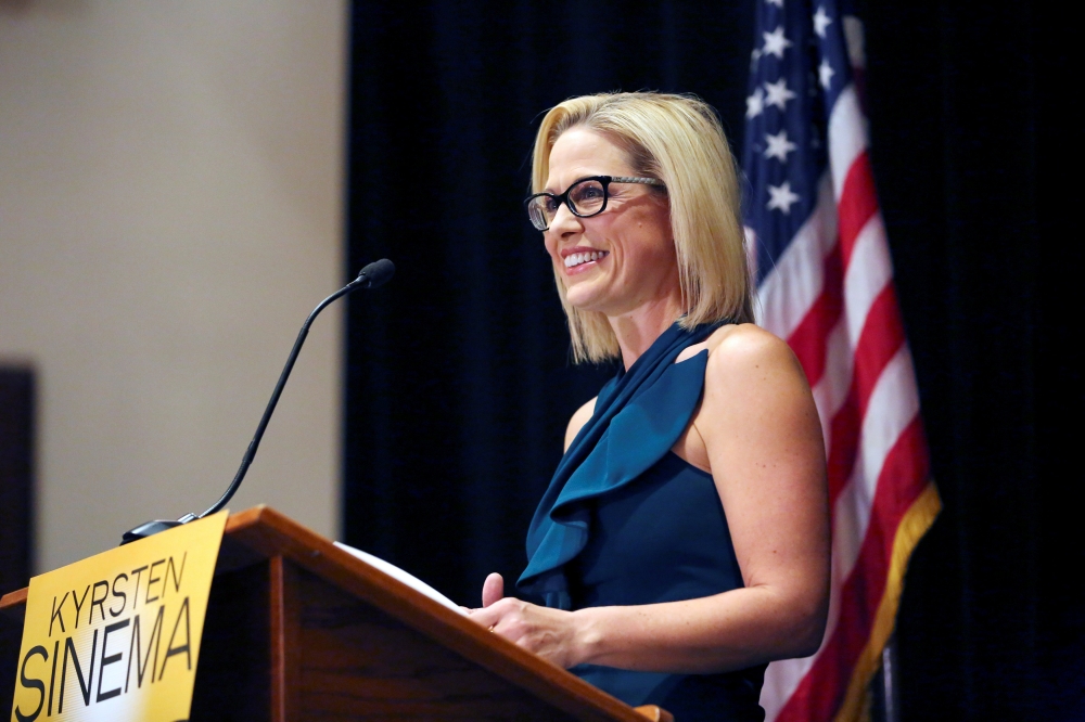 Democratic candidate Kyrsten Sinema speaks to supporters after officially winning the U.S. Senate race at the Omni Montelucia resort in Scottsdale, Arizona, U.S., November 12, 2018. REUTERS/Caitlin O'Hara