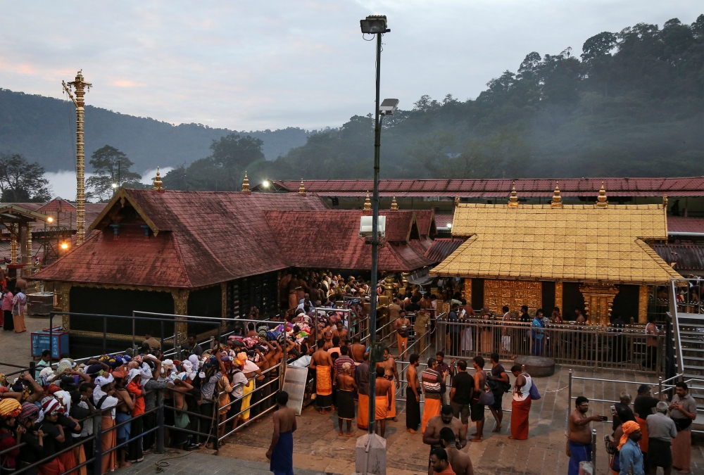 FILE PHOTO: Hindu devotees wait in queues inside the premises of the Sabarimala temple in Pathanamthitta district in the southern state of Kerala, India, October 18, 2018. Reuters/Sivaram V