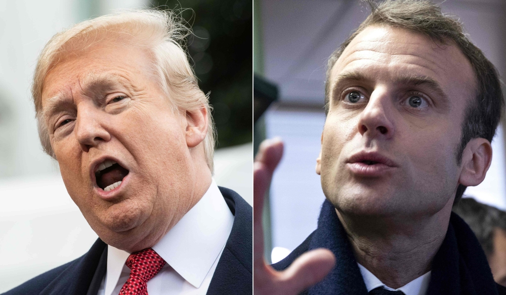 :(COMBO)  AFP /  NICHOLAS KAMM AND Etienne LAURENT
