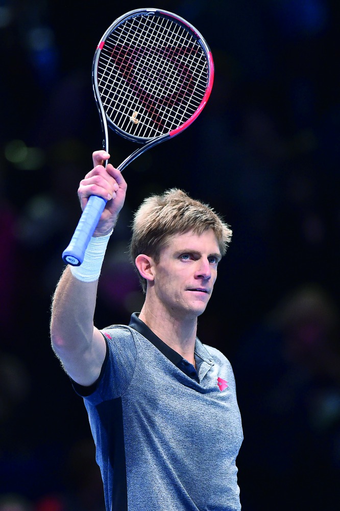 South Africa's Kevin Anderson celebrates beating Japan's Kei Nishikori during their men's singles round-robin match on day three of the ATP World Tour Finals tennis tournament at the O2 Arena in London on November 13, 2018. AFP / Glyn Kirk
