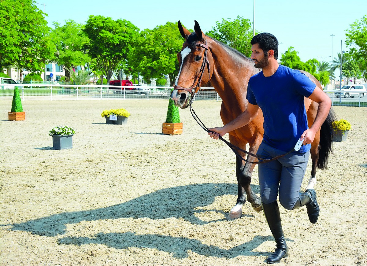 Vet checks being carried out by the technical staff at Qatar Equestrian Federation’s (QEF) Outdoor Arena ahead of this week’s Al Rayyan International Show Jumping Championship. 
