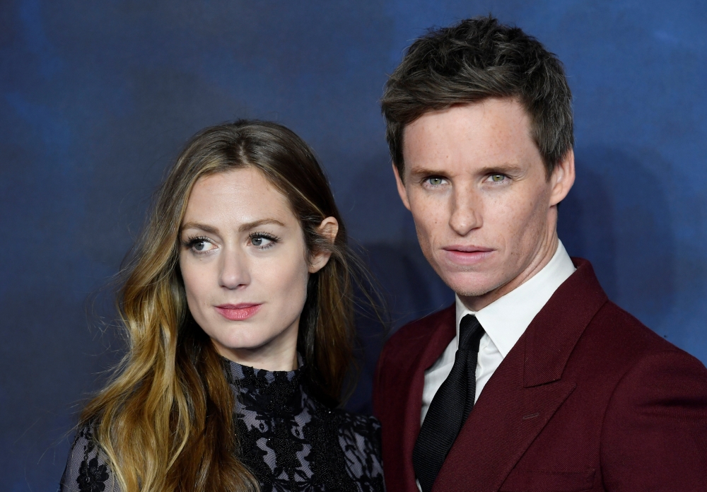 Actor Eddie Redmayne and his wife Hannah Bagshawe attend the British premiere of 'Fantastic Beasts: The Crimes of Grindelwald' movie in London, Britain, November 13, 2018. REUTERS/Toby Melville
 
