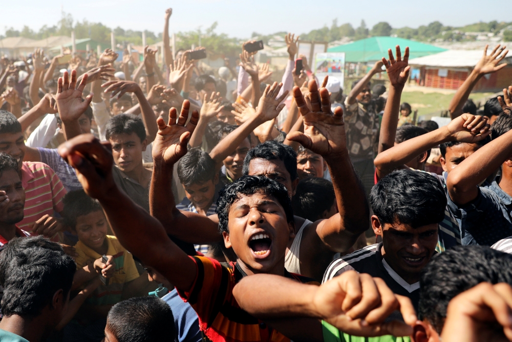 Hundreds of Rohingya refugees shout slogans as they protest against their repatriation at the Unchiprang camp in Teknaf, Bangladesh November 15, 2018. REUTERS/Mohammad Ponir Hossain