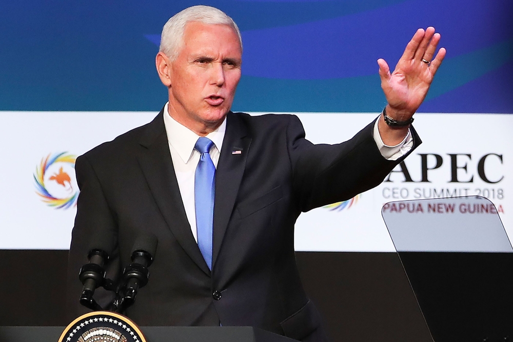 US Vice President Mike Pence gestures at the APEC CEO Summit 2018 in Port Moresby on November 17, 2018, a part of the Asia-Pacific Economic Cooperation (APEC) Summit. / AFP / POOL / Fazry ISMAIL