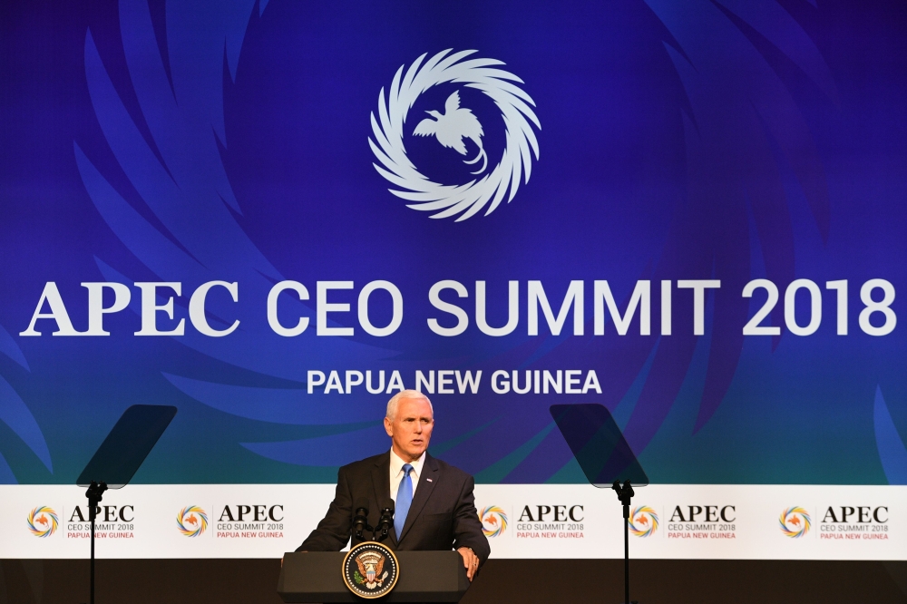 US Vice President Mike Pence delivers his keynote speech at the CEO Summit of the Asia-Pacific Economic Cooperation (APEC) summit in Port Moresby on November 17, 2018. / AFP / SAEED KHAN