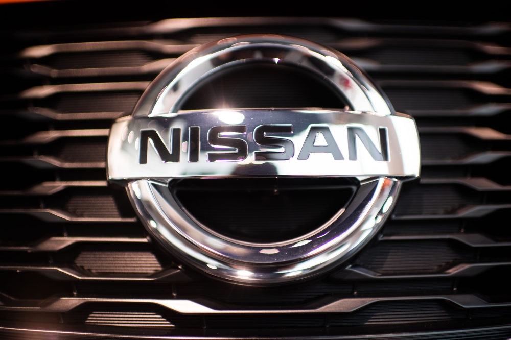 The logo of Nissan is seen at the headquarters of Nissan Motor Corporation in Yokohama on November 20, 2018. / AFP / Martin BUREAU 