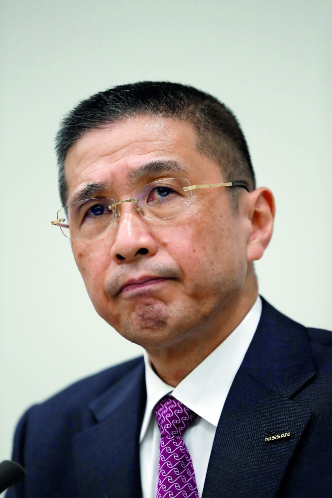 Nissan President and Chief Executive Officer Hiroto Saikawa attends a news conference after Japanese media reported that Nissan Chairman Carlos Ghosn will be arrested on suspicion of under-reporting his salary, at the company headquarters in Yokohama, sou