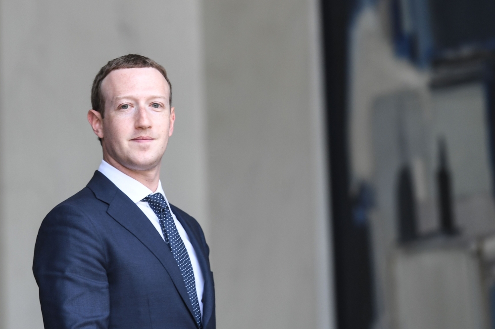  In this file photo taken on May 23, 2018 Facebook's CEO Mark Zuckerberg leaves the Elysee presidential palace, in Paris, following a meeting with French President on the day of the 