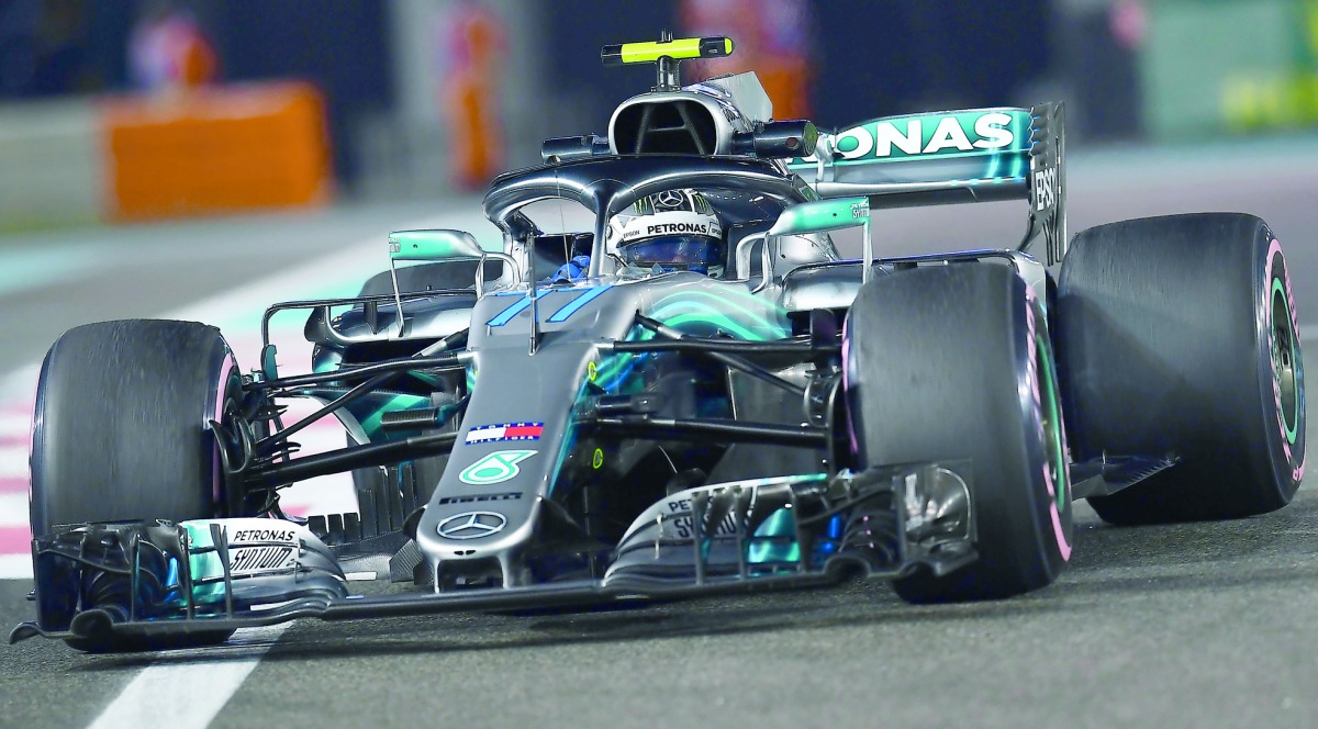 Mercedes' Finnish driver Valtteri Bottas steers his car during the second practice session at the Yas Marina circuit on November 23, 2018, in Abu Dhabi, ahead of the Abu Dhabi Formula One Grand Prix. AFP / Giuseppe Cacace

