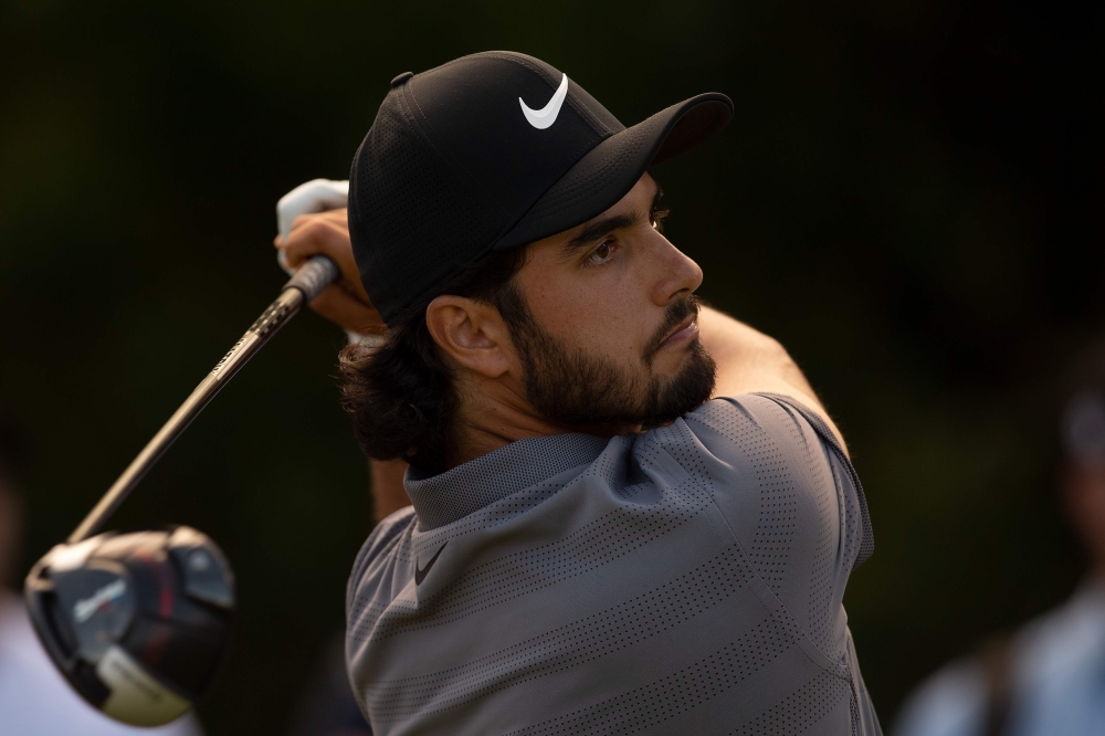 Mexico's Abraham Ancer tees off on the 12th hole during the final round of the Australian Open golf tournament at the Lakes Golf Club at Eastlakes in Sydney on November 18, 2018. AFP / STEVE CHRISTO 
