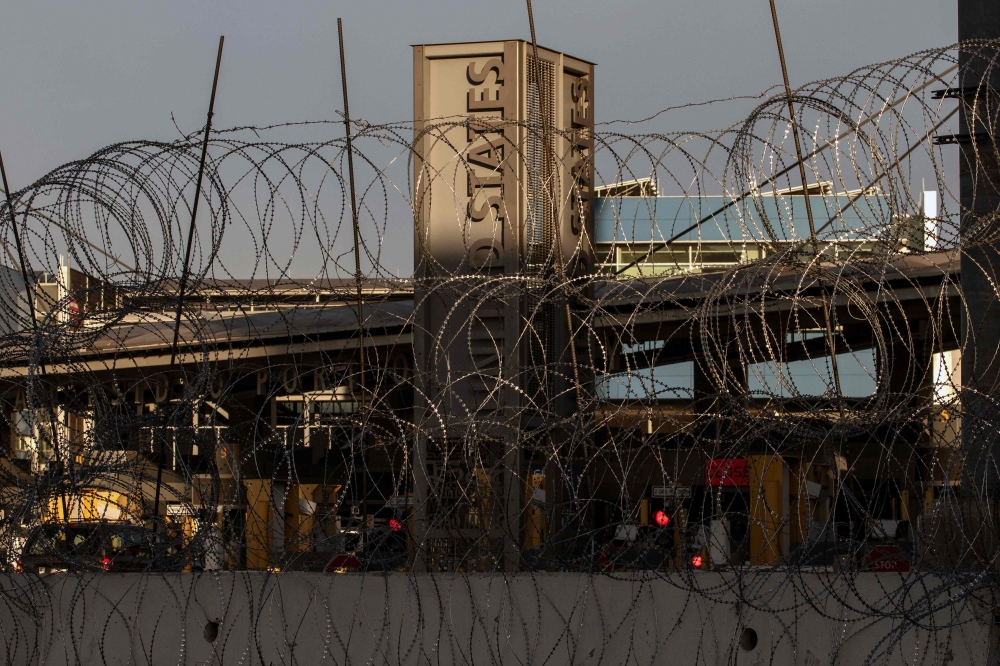 In this file photo taken on November 19, 2018 closed border crossing lines are seen at San Ysidro port of Entry, at the US-Mexico border, as US authorities prepare for the arrival of a Central American migrants' caravan, as seen from Tijuana, Mexico. / AF