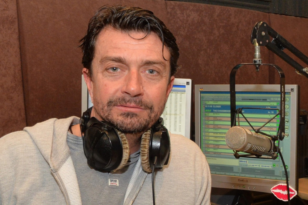 Radio One host Gavin Ford posing in the Lebanese based Radio station in the town of Beit Mery east of Beirut on January 26, 2017. AFP 